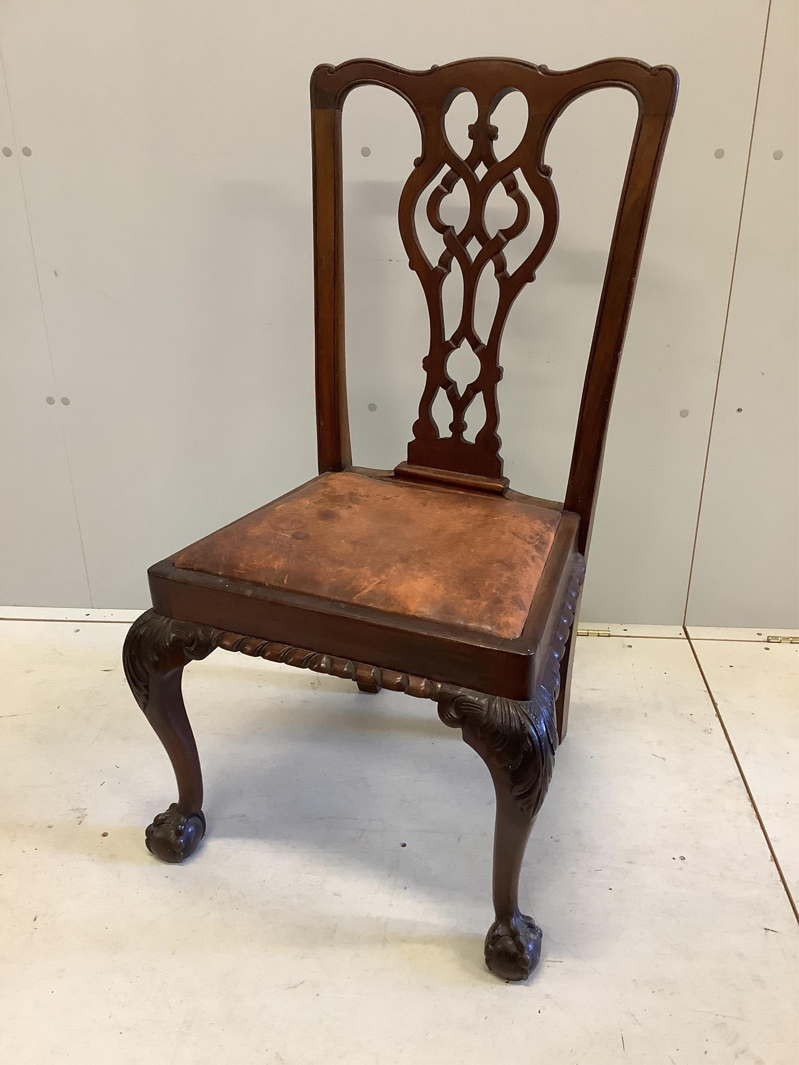 A Chippendale Revival rectangular mahogany table, width 152cm, depth 96cm, height 78cm and four chairs. Condition - fair